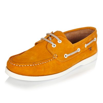 Yellow suede boat shoes